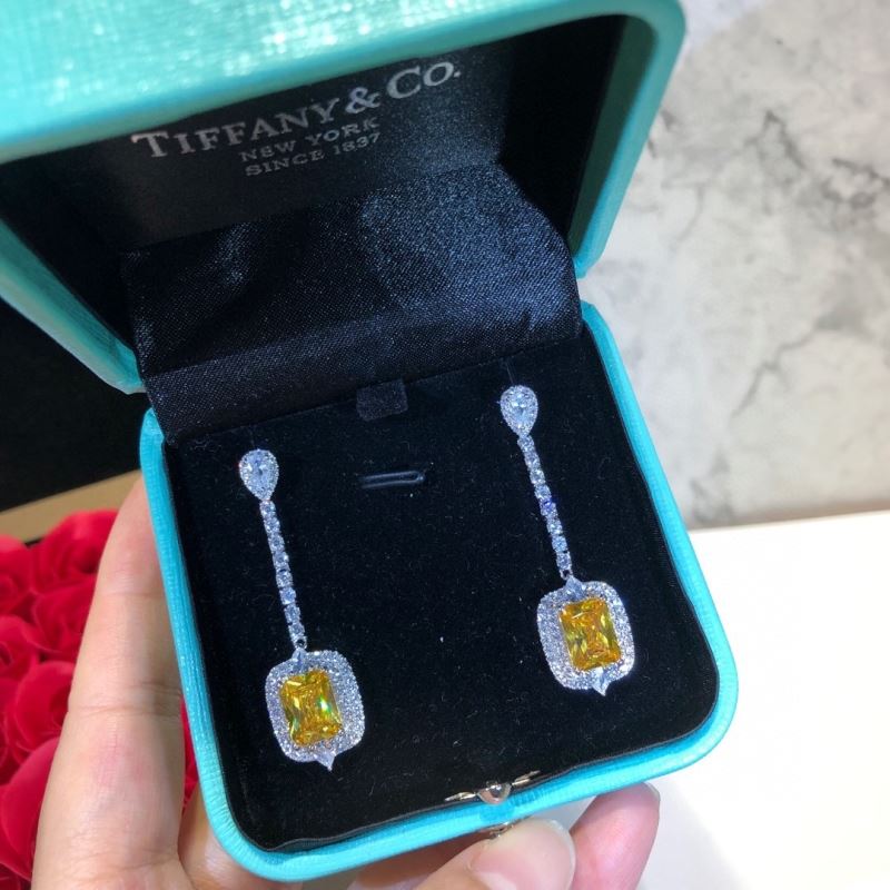 T*f*ny earrings